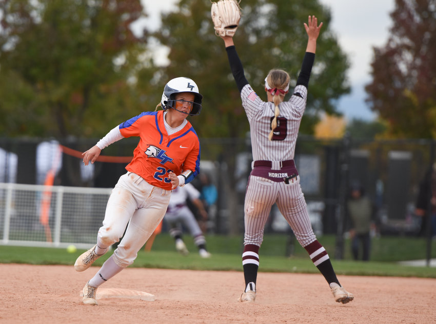 Legend's Kaylynn English heads to third base following a teammate's base hit during a CHSAA 5A state softball semifinal game against Horizon Oct. 23 at Aurora Sports Park. The Titans upset the No. 1-seeded Hawks,\ 7-2 en route to their 5A title win over Columbine 8-0.